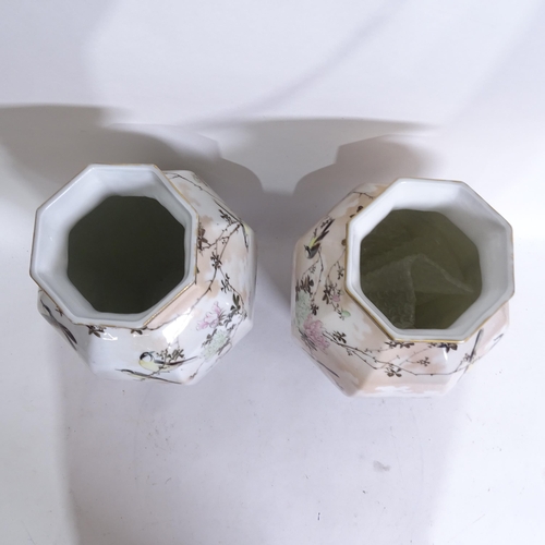 203 - A pair of Japanese hand painted porcelain octagonal vases, height 36cm