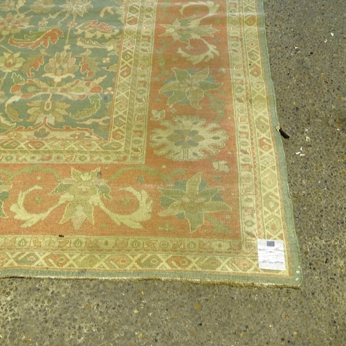 2731 - A Hill & Company cream ground Persian design carpet, 303cm x 248cm. Viewing by appointment.