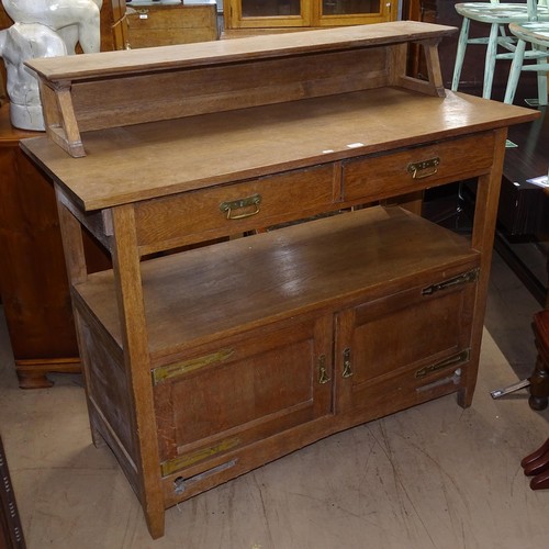 2106 - An oak Arts and Crafts buffet, W130cm, H120cm, D55cm