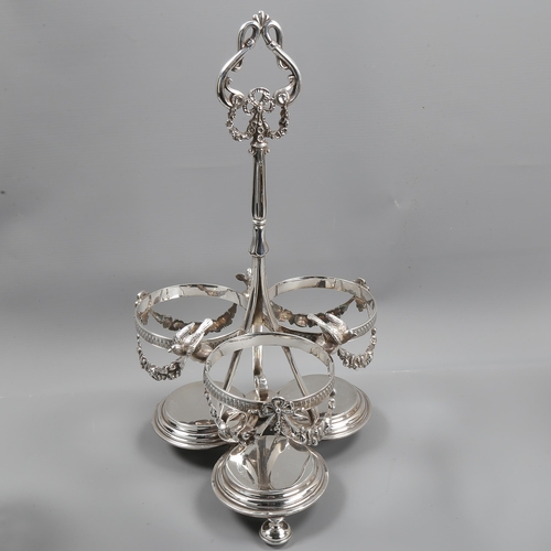 1032 - A 19th century electroplate 3-bottle decanter stand, with cast birds and floral swags, containing 3 ... 