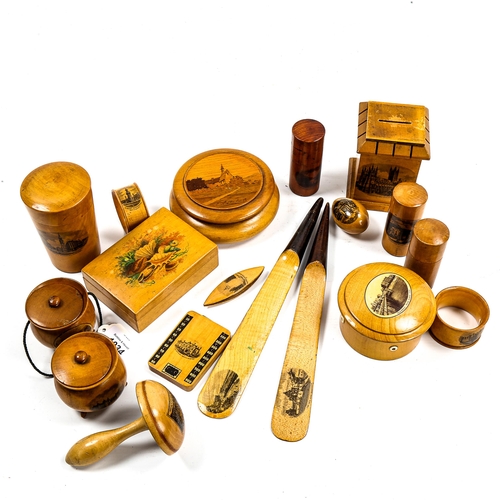 1034 - A collection of Victorian Mauchline Ware boxes and treen, including a pair of paper knives, a pair o... 