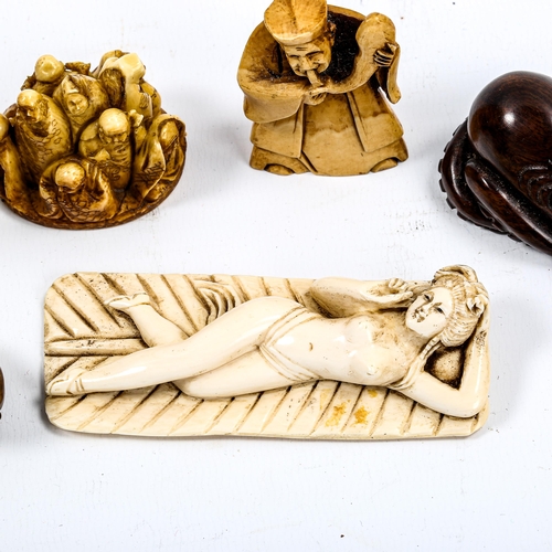 1049 - A group of Oriental ivory and wood netsuke, and an ivory stork design stand (8)