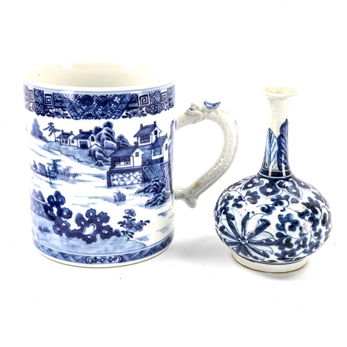 1067 - A large Chinese blue and white porcelain tankard with dragon handle, height 13cm, rim diameter 11cm,... 