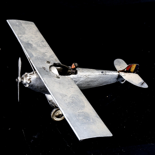 1088 - William Britains tin plate mono-plane with pilot, 1936, wingspan 21.5cm