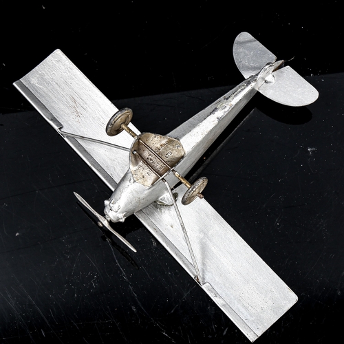 1088 - William Britains tin plate mono-plane with pilot, 1936, wingspan 21.5cm