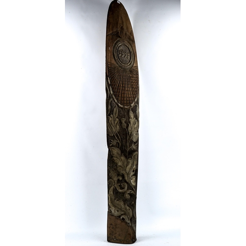 1102 - A Great War Period laminate wood aircraft propeller, with all over relief carved decoration, dated 1... 