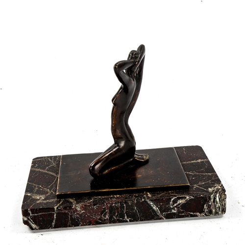 1104 - Contemporary patinated bronze female nude, unsigned on marble base, height 19cm, length 23cm