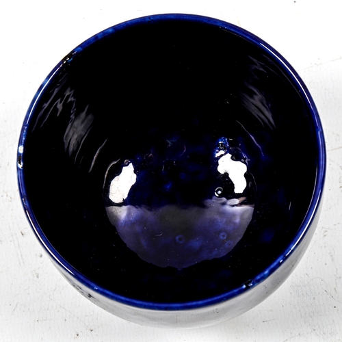 1109 - MOORCROFT - a dark blue glaze ceramic bowl, height 7.8cm