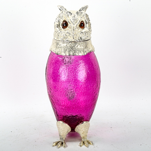 1112 - A ruby flash glass and electroplate owl design Claret jug, height 29cm