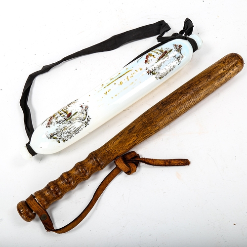 1114 - A Victorian opalescent glass rolling pin, length 34cm,  and an oak truncheon, length 42cm (2)