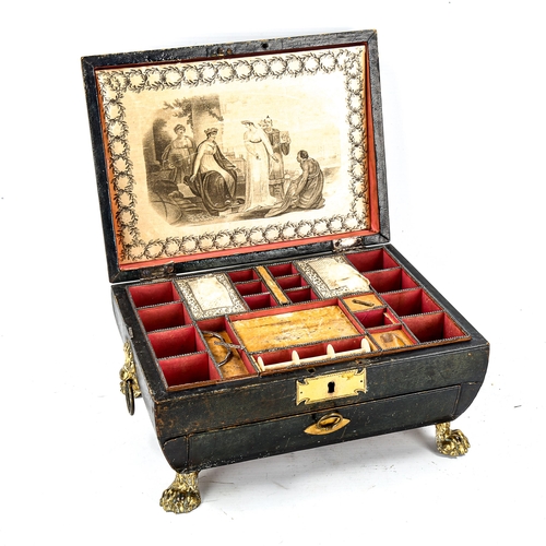 1121 - A Regency leather-covered sarcophagus-shaped sewing box, with brass mounts and lion paw feet, origin... 