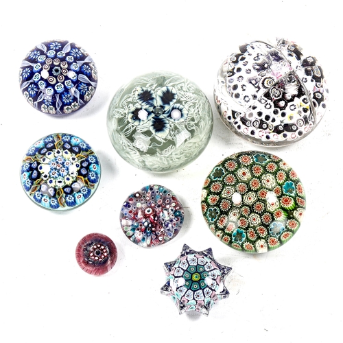 1128 - A group of Millefiori glass paperweights (8)