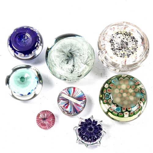 1128 - A group of Millefiori glass paperweights (8)