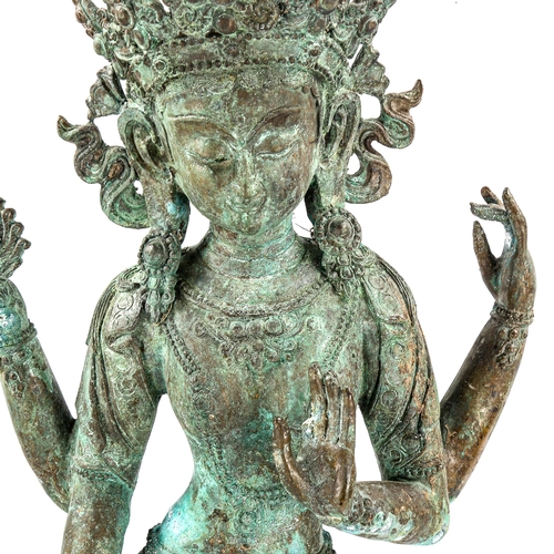 1130 - A large Indian verdigris bronze standing Buddha, height 73cm