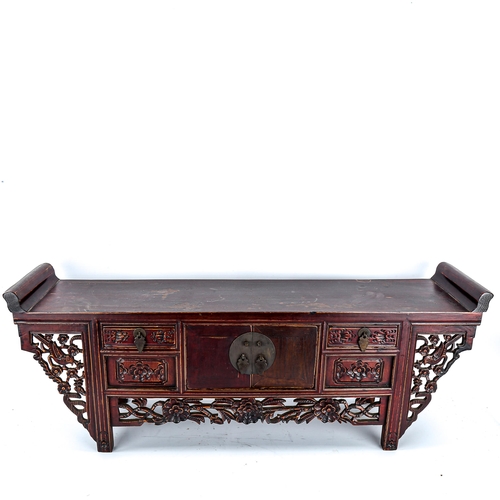 1134 - A Chinese stained wood altar table of small size, with 4 small carved drawers and central cupboard f... 