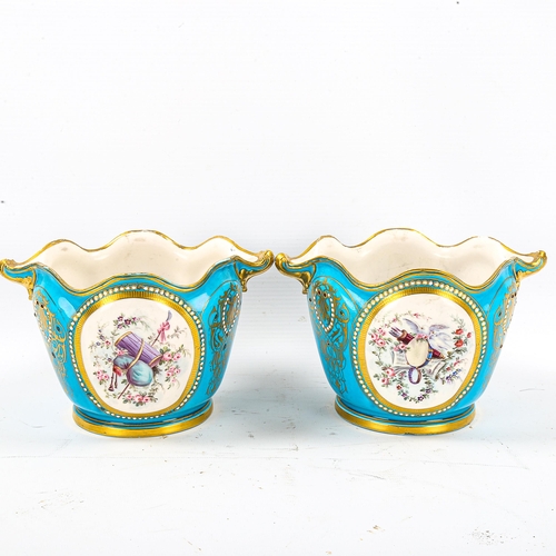 1145 - A pair of Sevres porcelain jardinieres, with painted portrait panels on turquoise ground with gildin... 