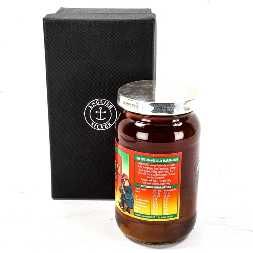 1150 - A jar of Robertson's Golden Shred Marmalade, with hallmarked silver lid, boxed