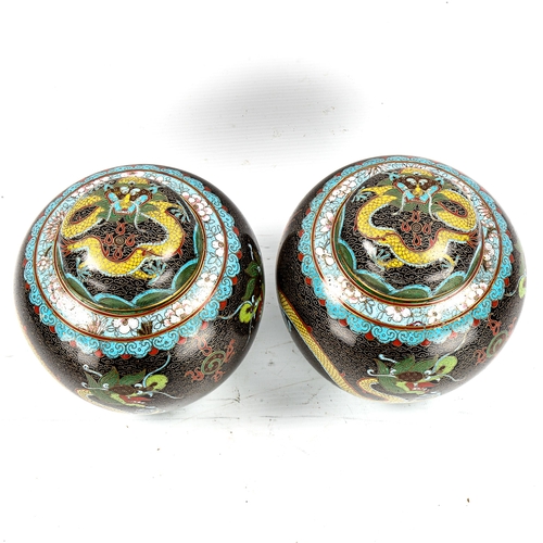 1155 - A pair of Chinese cloisonne enamel jars and covers, with dragon designs, height 18cm