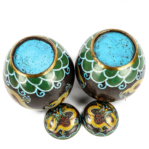 1155 - A pair of Chinese cloisonne enamel jars and covers, with dragon designs, height 18cm