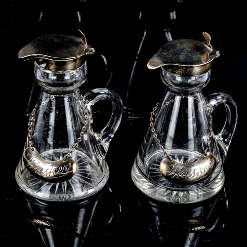 1157 - A pair of Edwardian silver-mounted glass Whisky noggins, with silver Whiskey labels, hallmarks Birmi... 