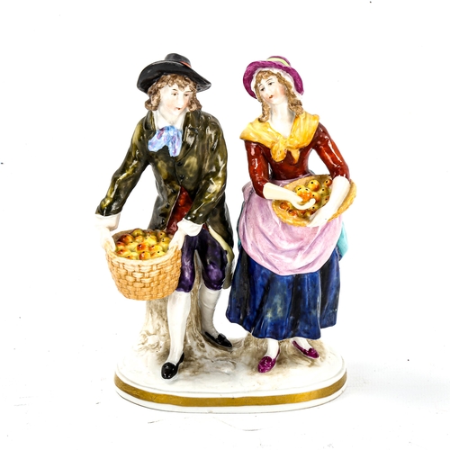 1164 - Porcelain group, a pair of fruit vendors, gold anchor mark, height 14.5cm