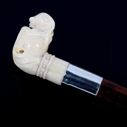 1171 - A 19th century carved ivory Bulldog-head handled walking cane with glass eyes, and sterling silver c... 