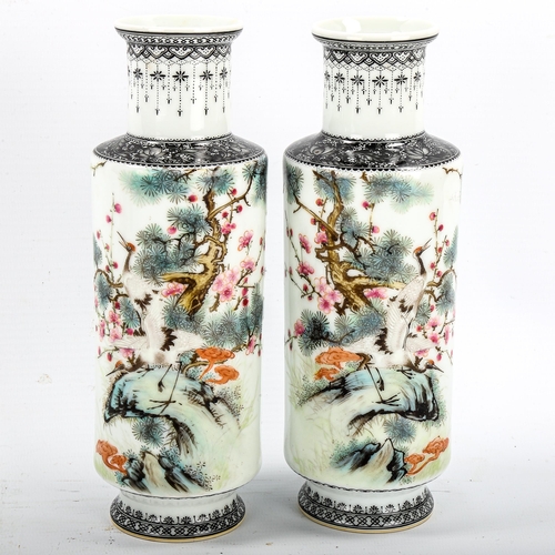 1174 - A pair of Chinese white glaze porcelain sleeve vases, with painted exotic birds and text, seal marks... 