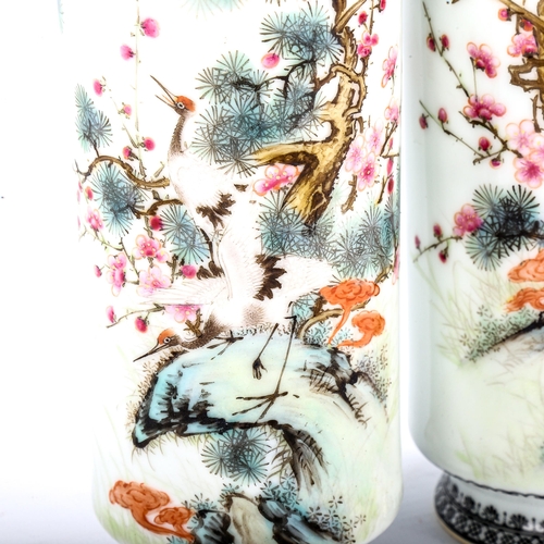 1174 - A pair of Chinese white glaze porcelain sleeve vases, with painted exotic birds and text, seal marks... 