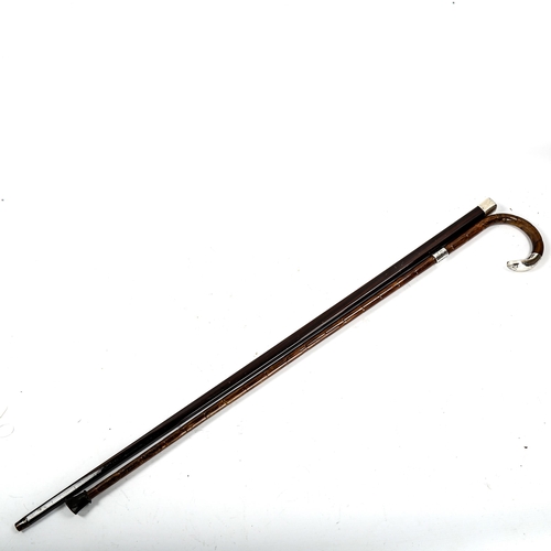 1179 - 2 early 20th century silver-mounted walking canes