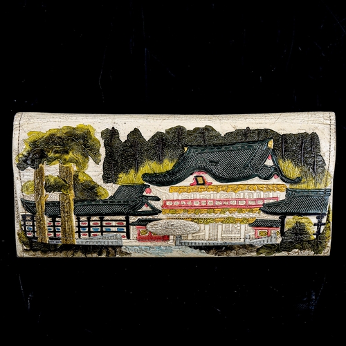 1182 - A Japanese tooled leather lady's vanity case, with temple scenes and Mount Fuji, length 19.5cm