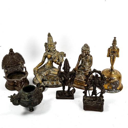 1193 - A group of Indian bronze deities, a bronze bell, an incense burner etc (7)