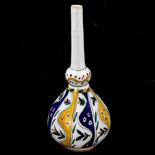 1210 - A Turkish Kutahya pottery rose water sprinkler, height 22cm