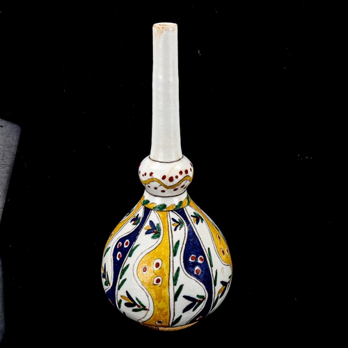 1210 - A Turkish Kutahya pottery rose water sprinkler, height 22cm