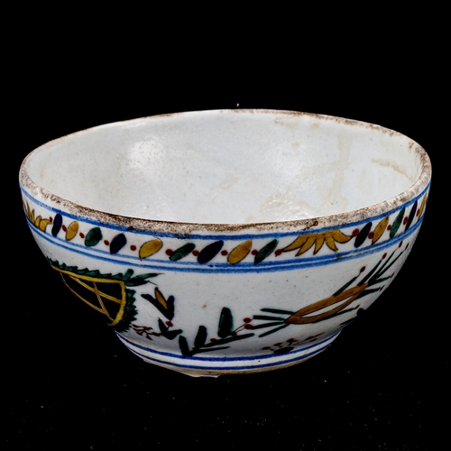 1216 - A Turkish Kutahya pottery bowl with painted decoration, diameter 12.5cm