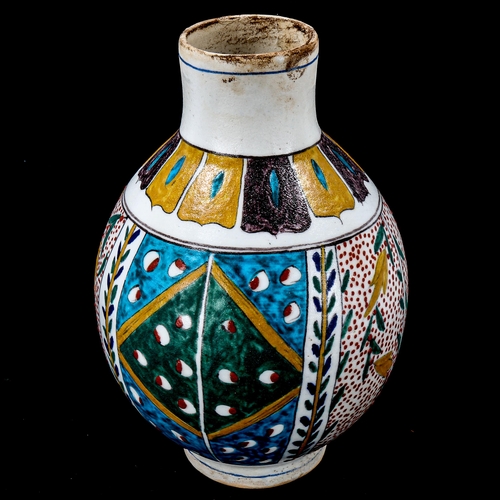 1218 - A Turkish Kutahya pottery vase with painted decoration, height 18cm