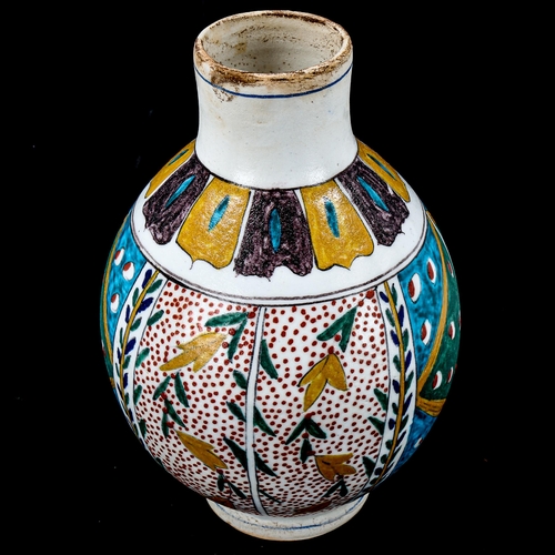 1218 - A Turkish Kutahya pottery vase with painted decoration, height 18cm