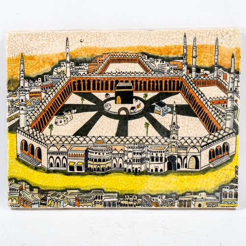 1219 - A Turkish Islamic pottery wall tile, depicting Mecca, 29cm x 37.5cm