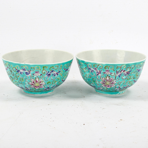 1225 - A pair of Chinese porcelain rice bowls, with enamel bat designs on turquoise ground, character marks... 