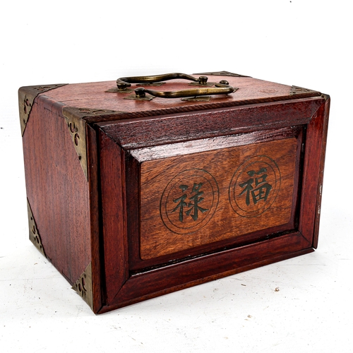 1227 - A Chinese bone and bamboo Mahjong set, in original brass-bound hardwood cabinet, with brass carrying... 