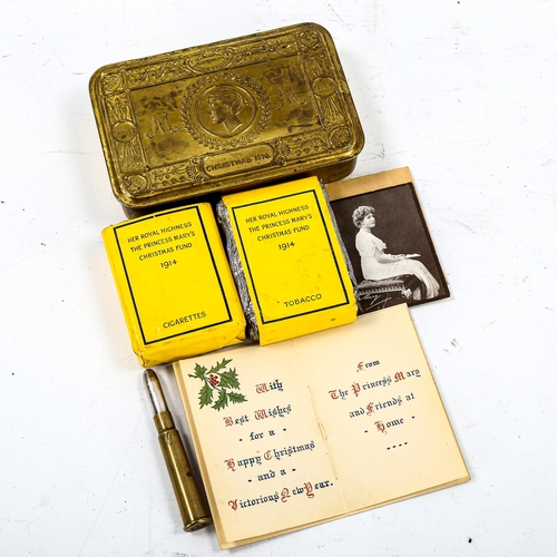 1228 - A 1914 Queen Mary Christmas tin with original contents, including bullet pencil and cigarettes