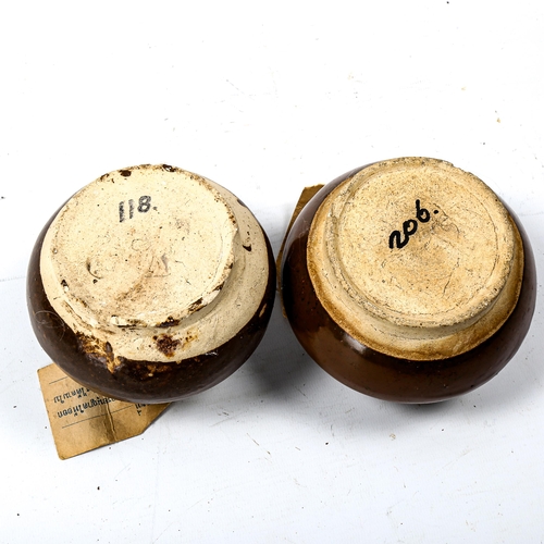 1233 - A pair of Thai brown glaze pottery jars, diameter 11cm, with attached export documents