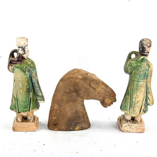 1236 - A Han Dynasty terracotta horse head, height 14cm, and a pair of partially glazed pottery figures, he... 