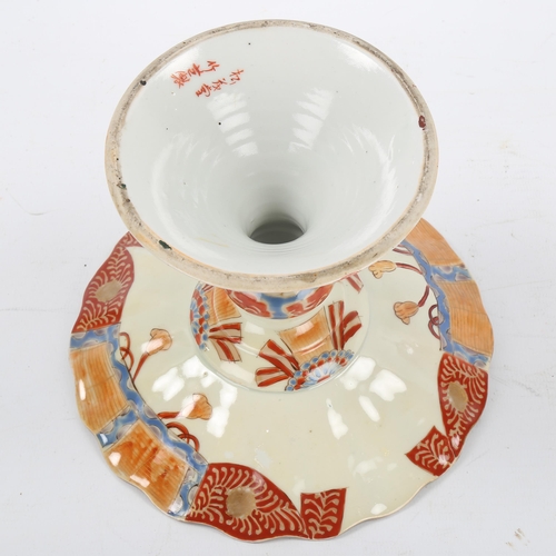 1240 - A Japanese porcelain tazza with painted and gilded decoration, signed under base, diameter 17.5cm, h... 