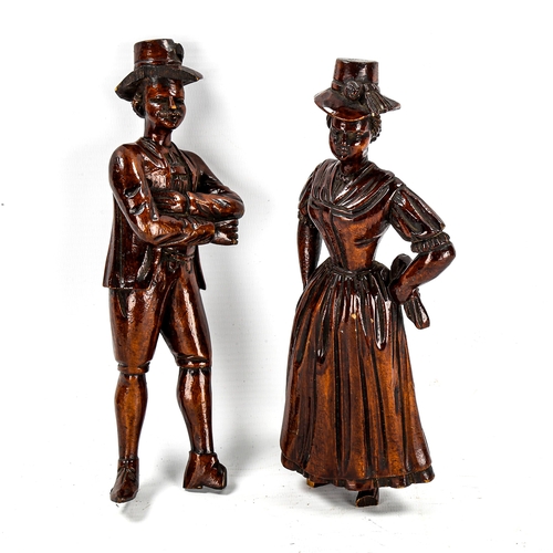 1258 - A pair of 19th century Black Forest carved wood standing country figures, height 22cm