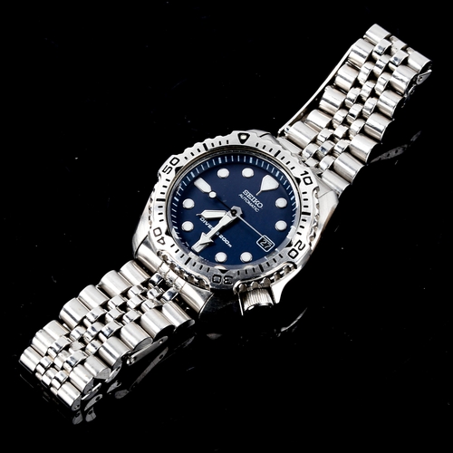 82 - SEIKO - a stainless steel Scuba Diver's automatic bracelet watch, ref. 7002-7020, blue dial with lum... 