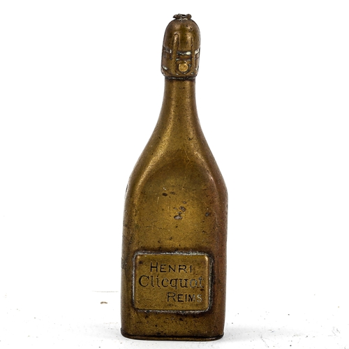 1197 - An Austrian brass novelty Vesta case, in the form of a bottle of Henri Clicquot Champagne, length 6.... 