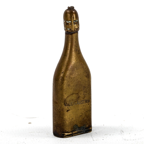 1197 - An Austrian brass novelty Vesta case, in the form of a bottle of Henri Clicquot Champagne, length 6.... 