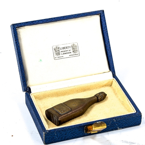 1197 - An Austrian brass novelty Vesta case, in the form of a bottle of Henri Clicquot Champagne, length 6.... 