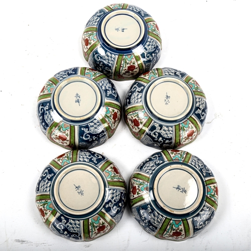 1201 - A set of 5 Japanese porcelain bowls, with hand painted surrounds, signed, diameter 13cm