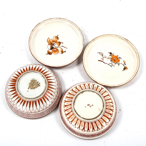 1203 - A pair of Japanese Satsuma porcelain circular boxes and covers, with painted lid depicting a group o... 